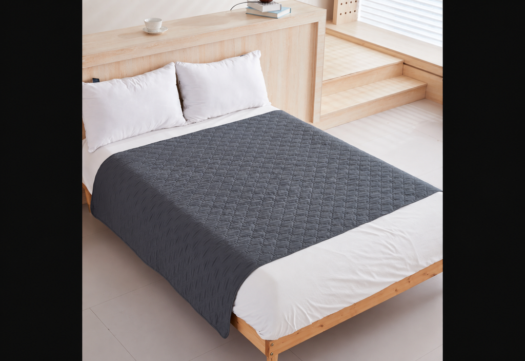 Dark Grey DryNest Waterproof Pet Blanket on a bed with no pets